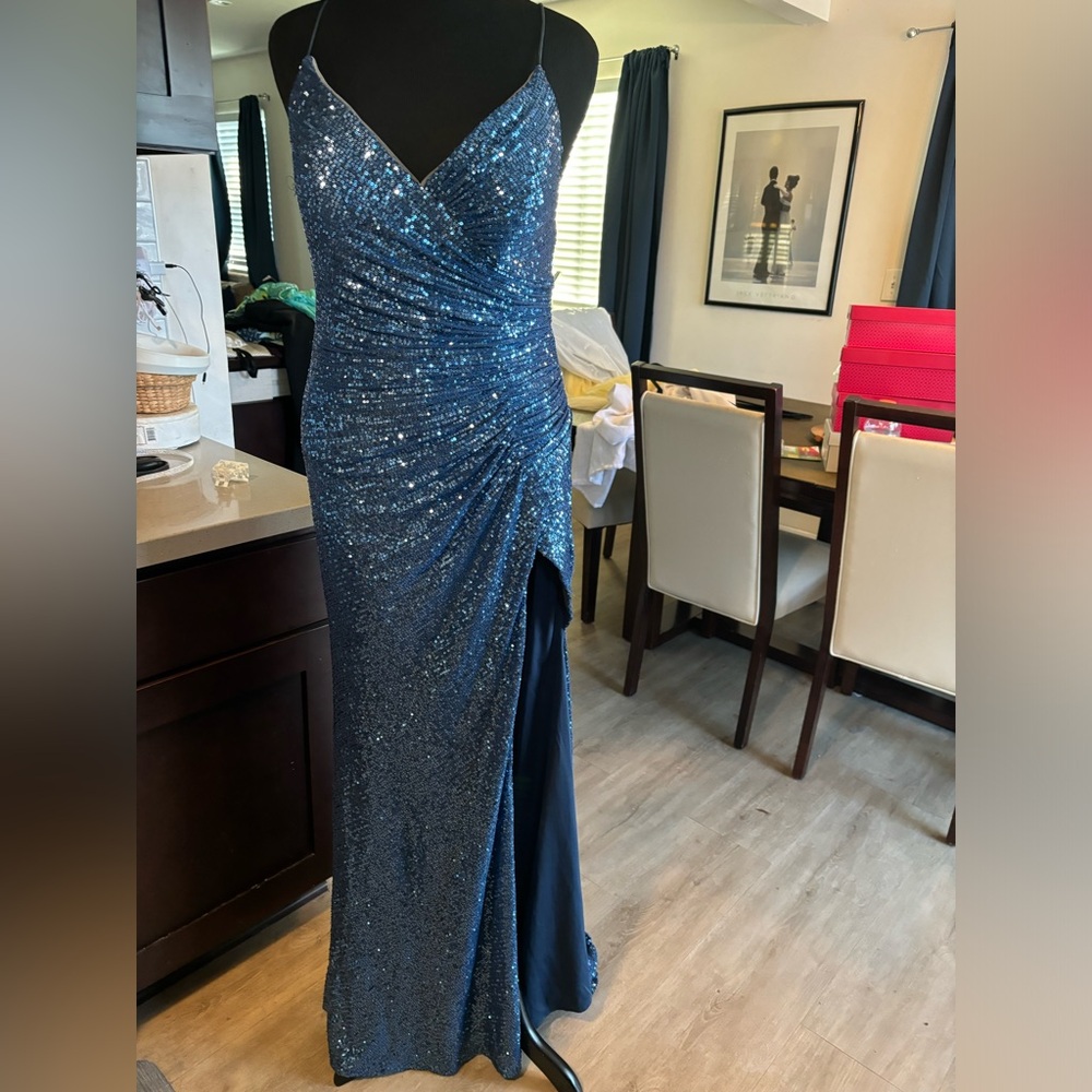 Long Blue Sequin Dress 
Size 2xl, but runs small. More like XL